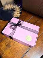 Gift box of authentic New Orleans pecan pralines, individually wrapped and ready for gifting.