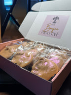 Gift box of wedding cake-inspired New Orleans pecan pralines, individually wrapped and ready for gifting.