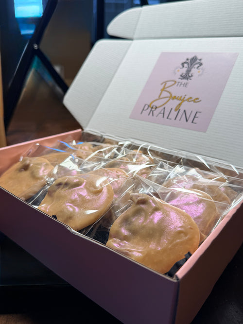 Gift box of wedding cake-inspired New Orleans pecan pralines, individually wrapped and ready for gifting.